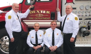 These four members of the Dexter Fire Department represent 151 years of service. From left to right: Fire Chief Don Seymore, Assistant Fire Chief Dave Rowe, Captain Dale Rowe and Captain John Jenkins.