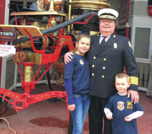 Chief “Smokey” Dyer and his grand-kids at the opening of Fireman’s Landing at Silver Dollar City.